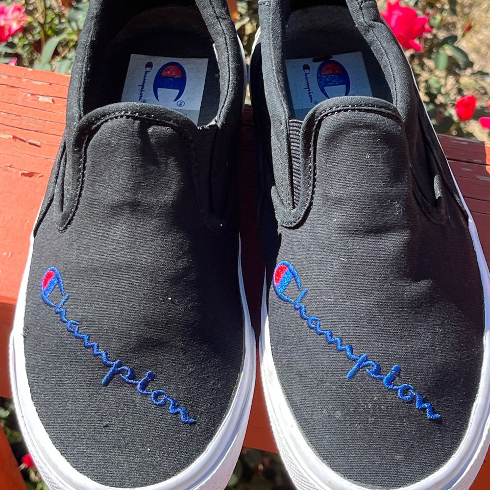 Champion fringe slip on casual canvas sneakers.
